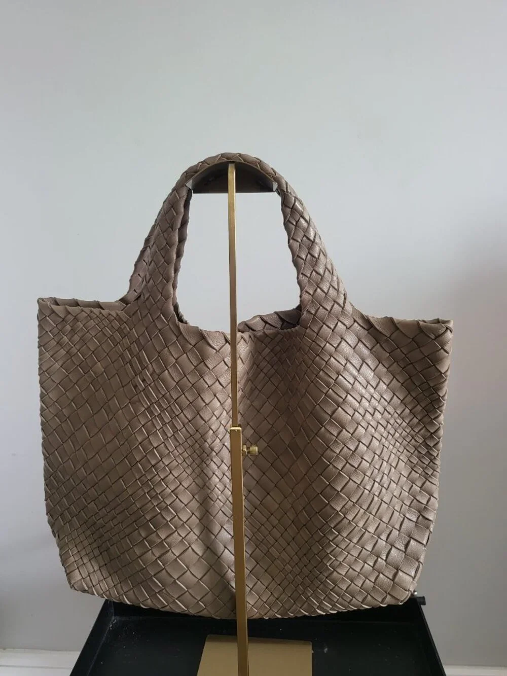 Taupe woven leather handbag